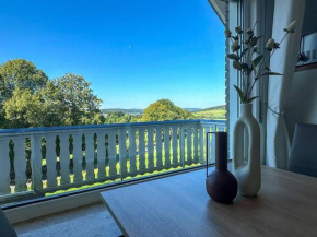 Bovenappartement in Winterberg met balkon en uitzicht over het bos